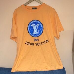 Louis Vuitton Vibrant Orange Tee with Blue and White Logo